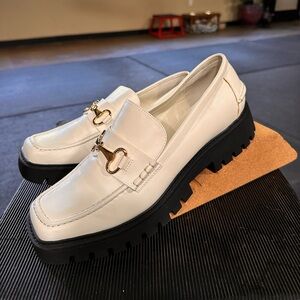 Chic Cream Loafers with Gold Detail